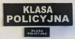 Napis KLASA POLICYJNA biały haft na czarnym filcu